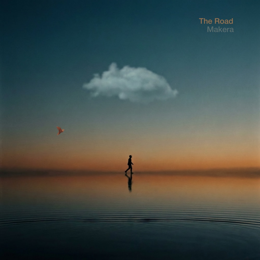 The Road cover artwork — a figure walking across still water at sunset under a single cloud